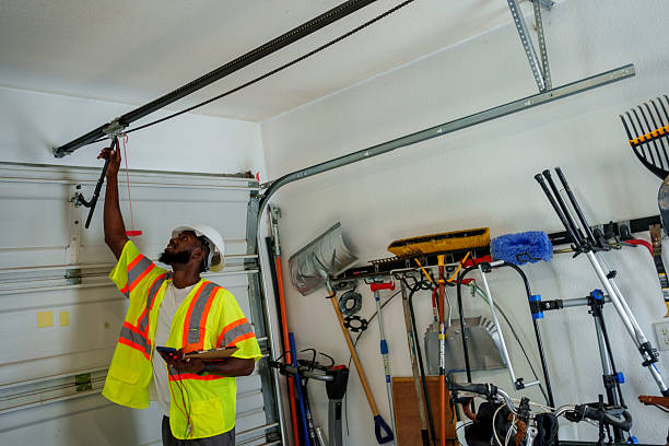 Professional Garage Door Panel Replacement technician working in Jonesboro, IN